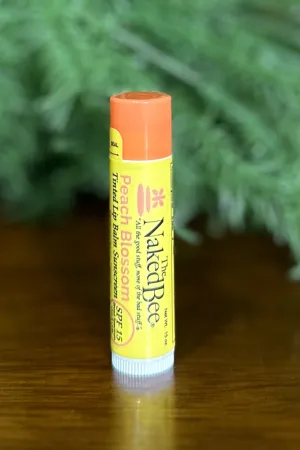 SPF 15 Orange Blossom Honey Tinted Lip Balm in Peach Blossom by Naked Bee